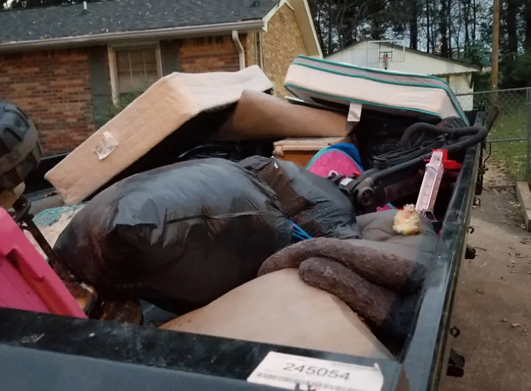 house junks on a dumpster